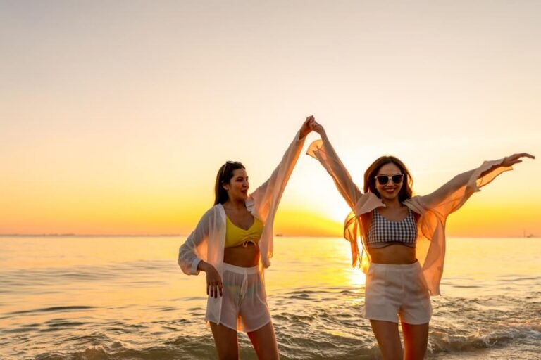 Two young women in their 20s enjoying a beach vacation